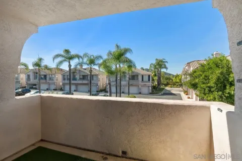 a view of a building from a balcony