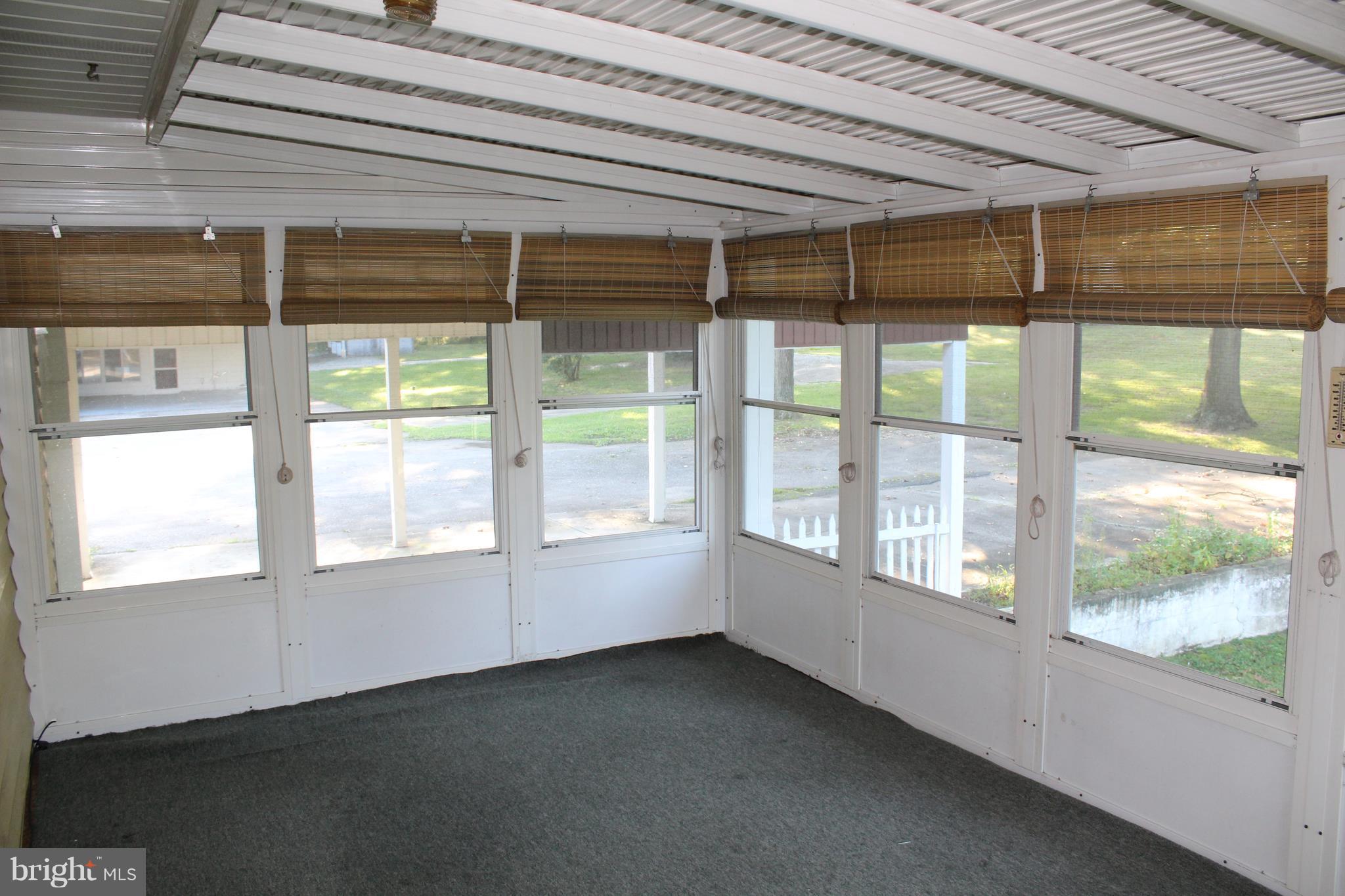 783 Queenstown Road Severn, MD 21144 - Photo 14 of 29 View of the screen porch of the kitchen