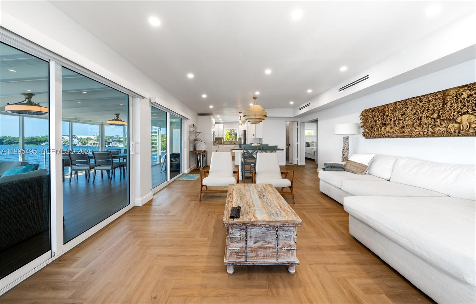 188 Orange Blossom Road Tavernier, FL 33070 - Photo 18 of 41 a living room with furniture and a wooden floor