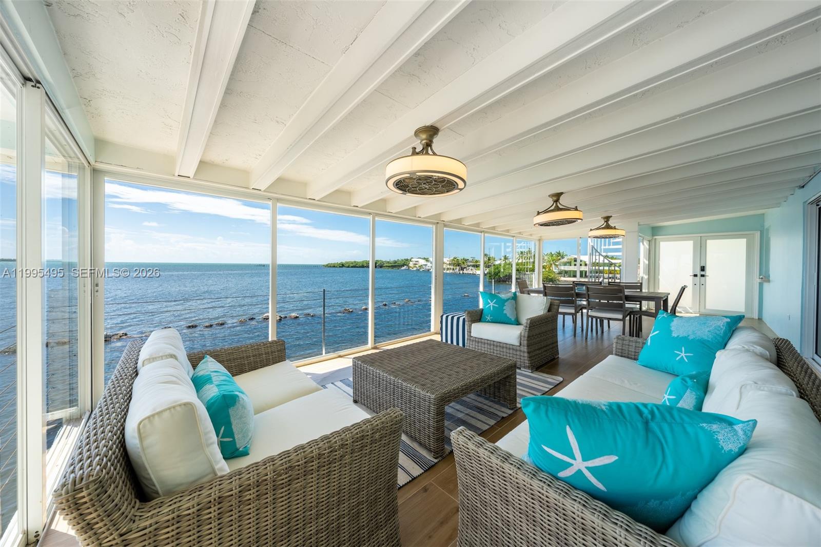 188 Orange Blossom Road Tavernier, FL 33070 - Photo 37 of 41 a outdoor living space with furniture and garden view