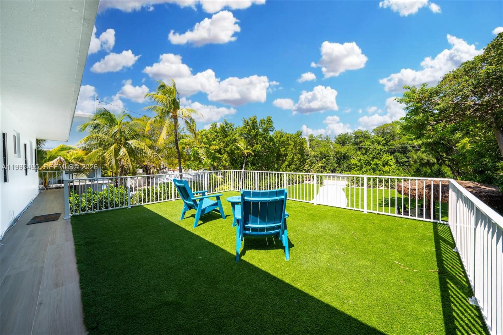 188 Orange Blossom Road Tavernier, FL 33070 - Photo 40 of 41 a view of a house with swimming pool