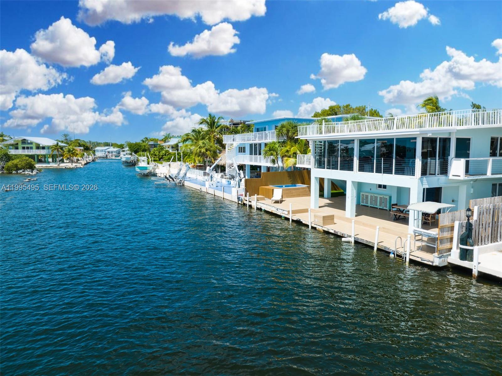 188 Orange Blossom Road Tavernier, FL 33070 - Photo 6 of 41 a view of a lake with houses