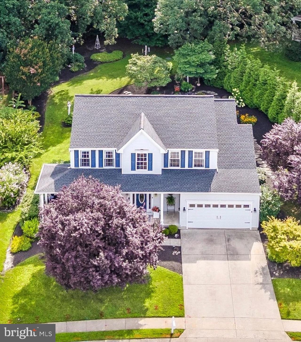 an aerial view of house with yard