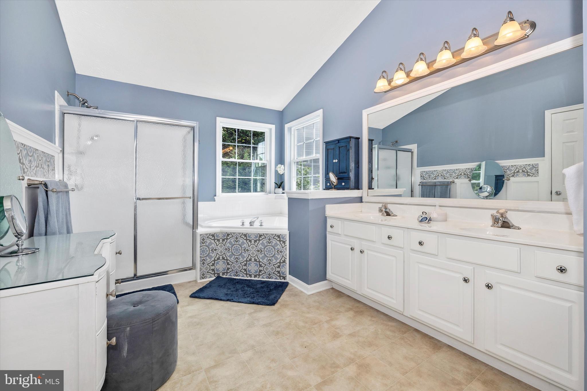 3137 Pyramid Circle Manchester, MD 21102 - Photo 11 of 55 a bathroom with a double vanity sink mirror and shower