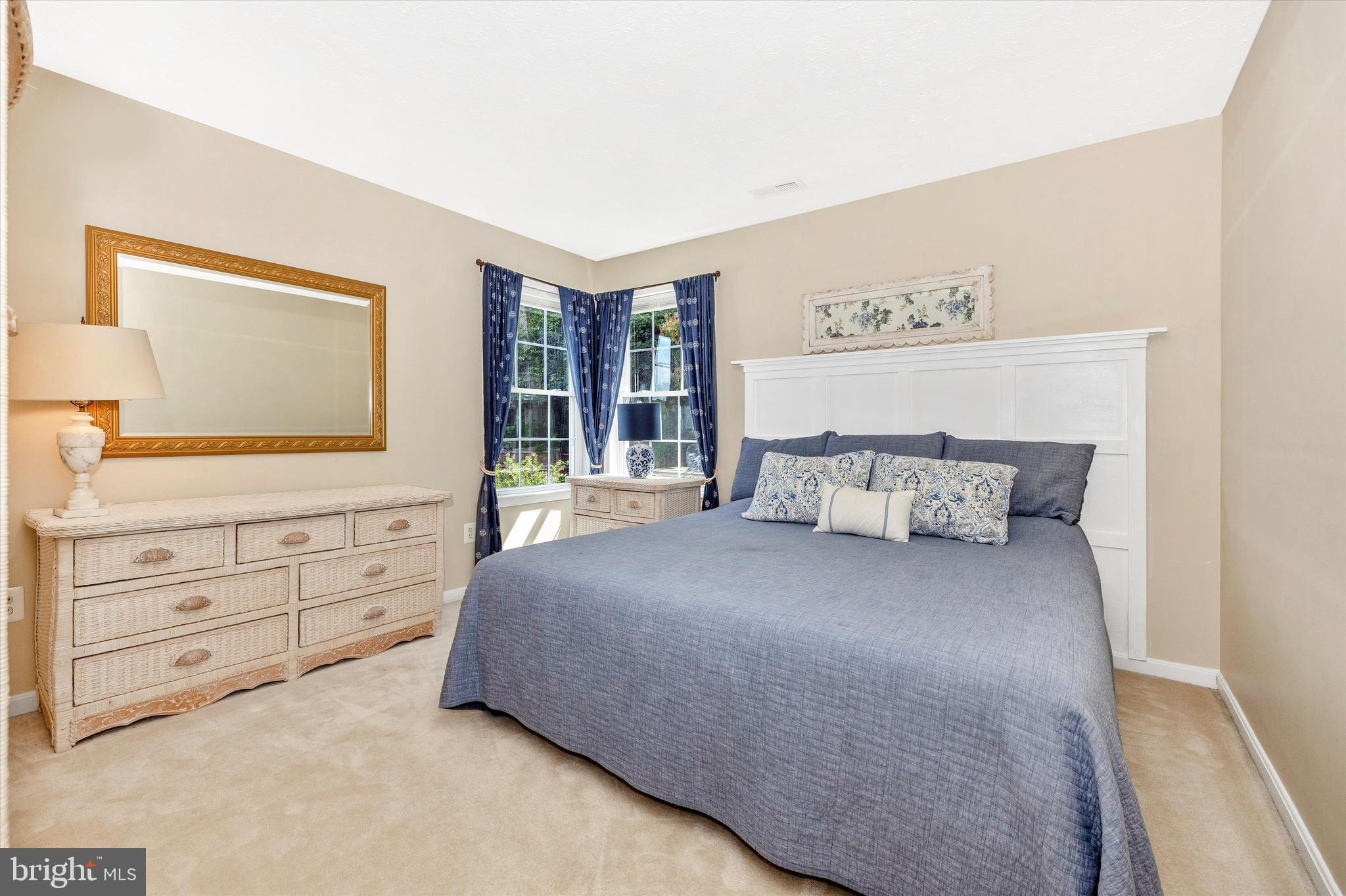 3137 Pyramid Circle Manchester, MD 21102 - Photo 13 of 55 a bed room with a bed and a dresser