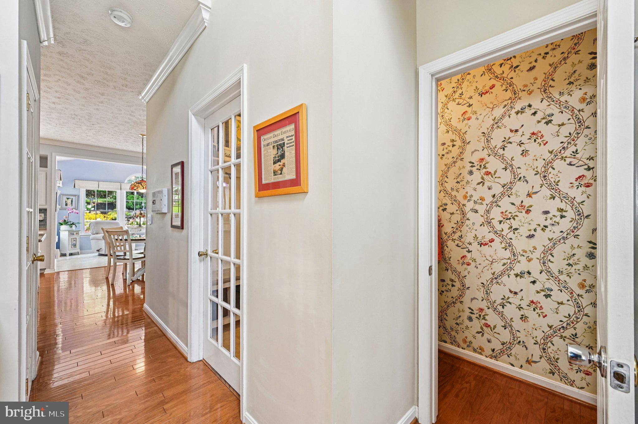 3137 Pyramid Circle Manchester, MD 21102 - Photo 18 of 55 a view of a hallway with wooden floor and dining room