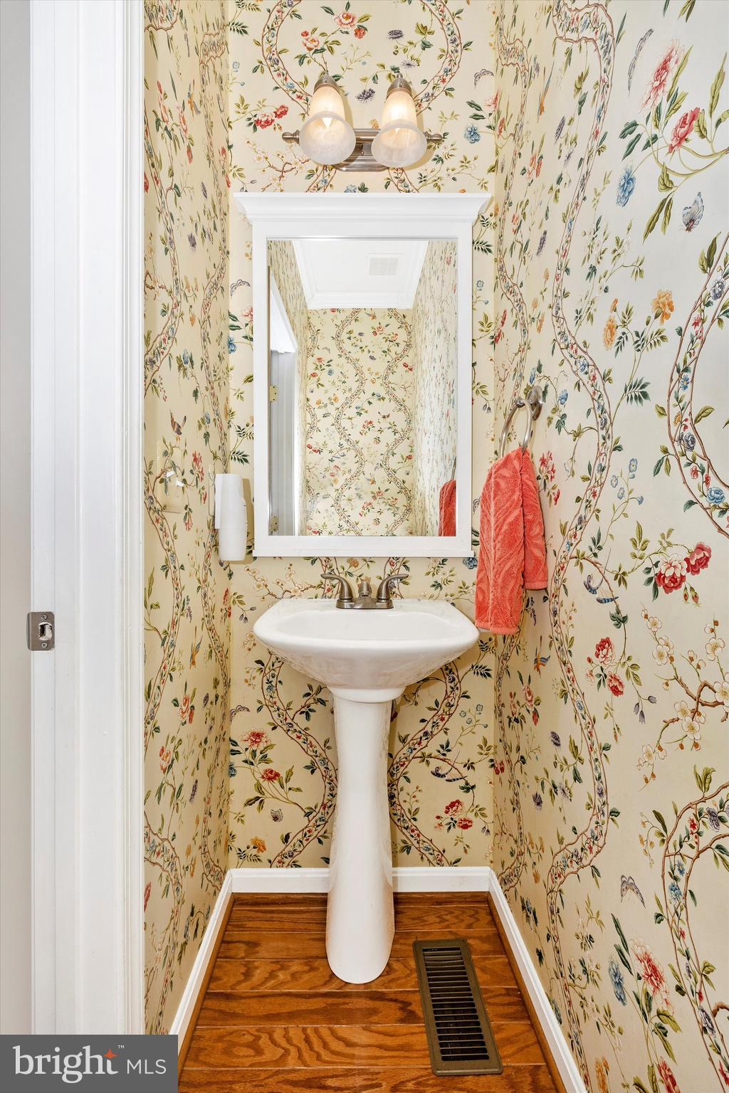 3137 Pyramid Circle Manchester, MD 21102 - Photo 19 of 55 a bathroom with a sink and mirror with bathtub