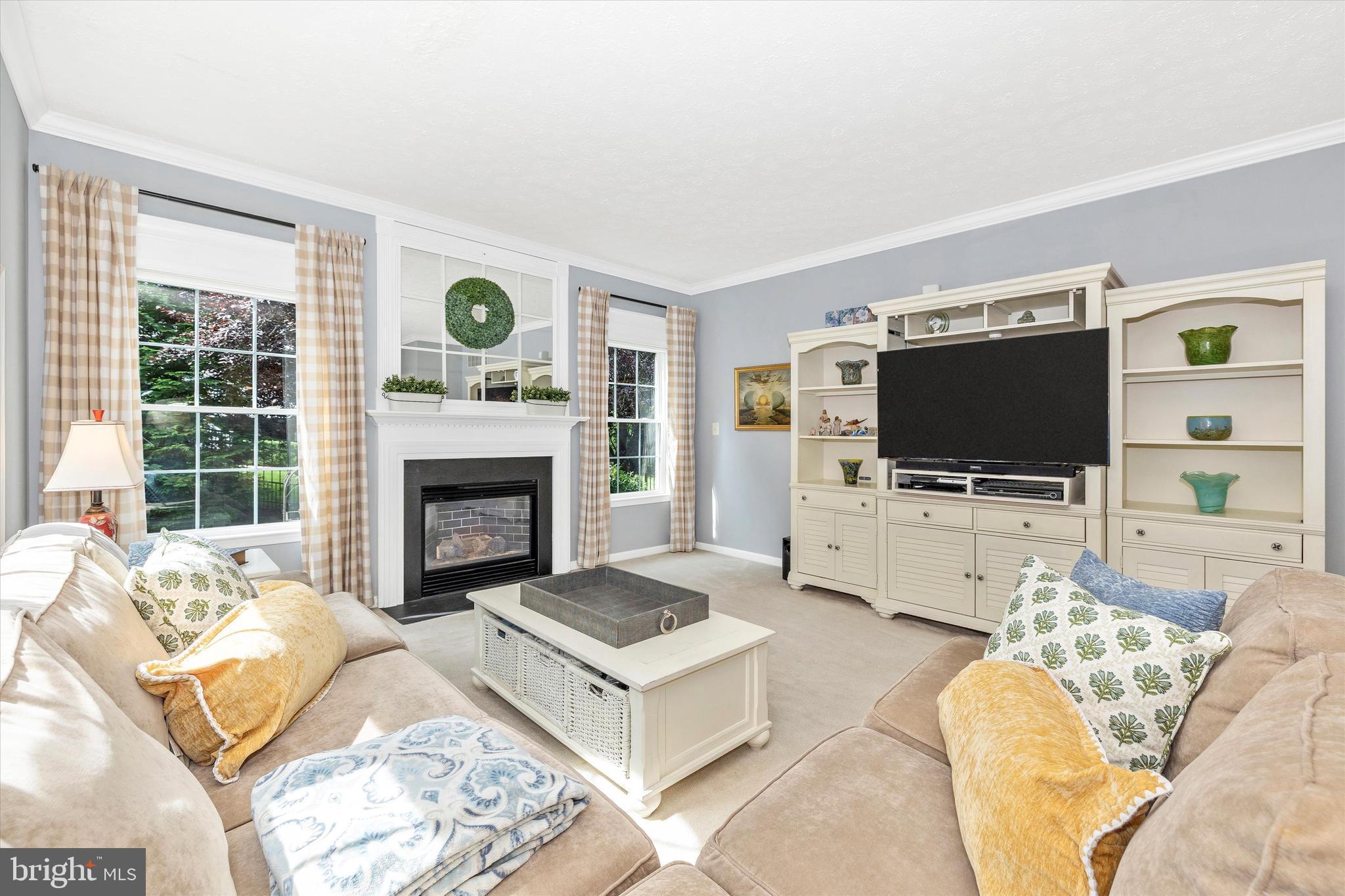 3137 Pyramid Circle Manchester, MD 21102 - Photo 21 of 55 a living room with furniture and a flat screen tv