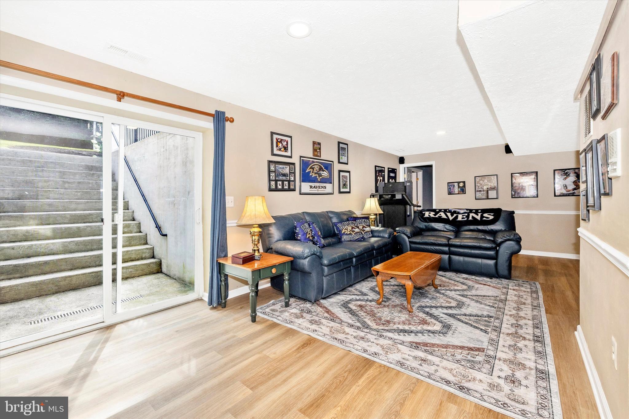 3137 Pyramid Circle Manchester, MD 21102 - Photo 28 of 55 a living room with lots of furniture and a rug