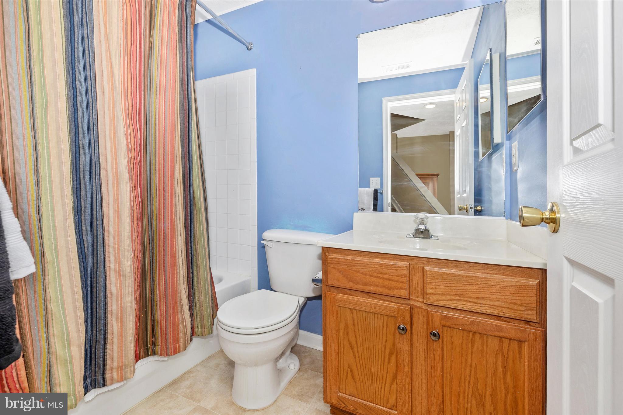 3137 Pyramid Circle Manchester, MD 21102 - Photo 31 of 55 a bathroom with a toilet a sink and a mirror