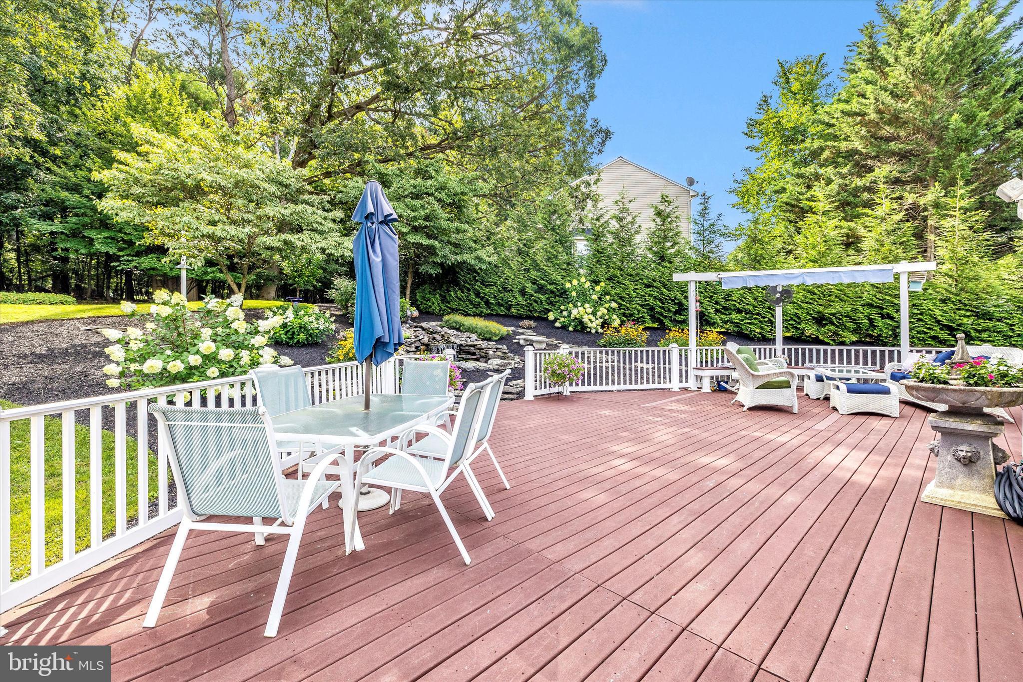 3137 Pyramid Circle Manchester, MD 21102 - Photo 37 of 55 a view of a chair and tables on the roof deck