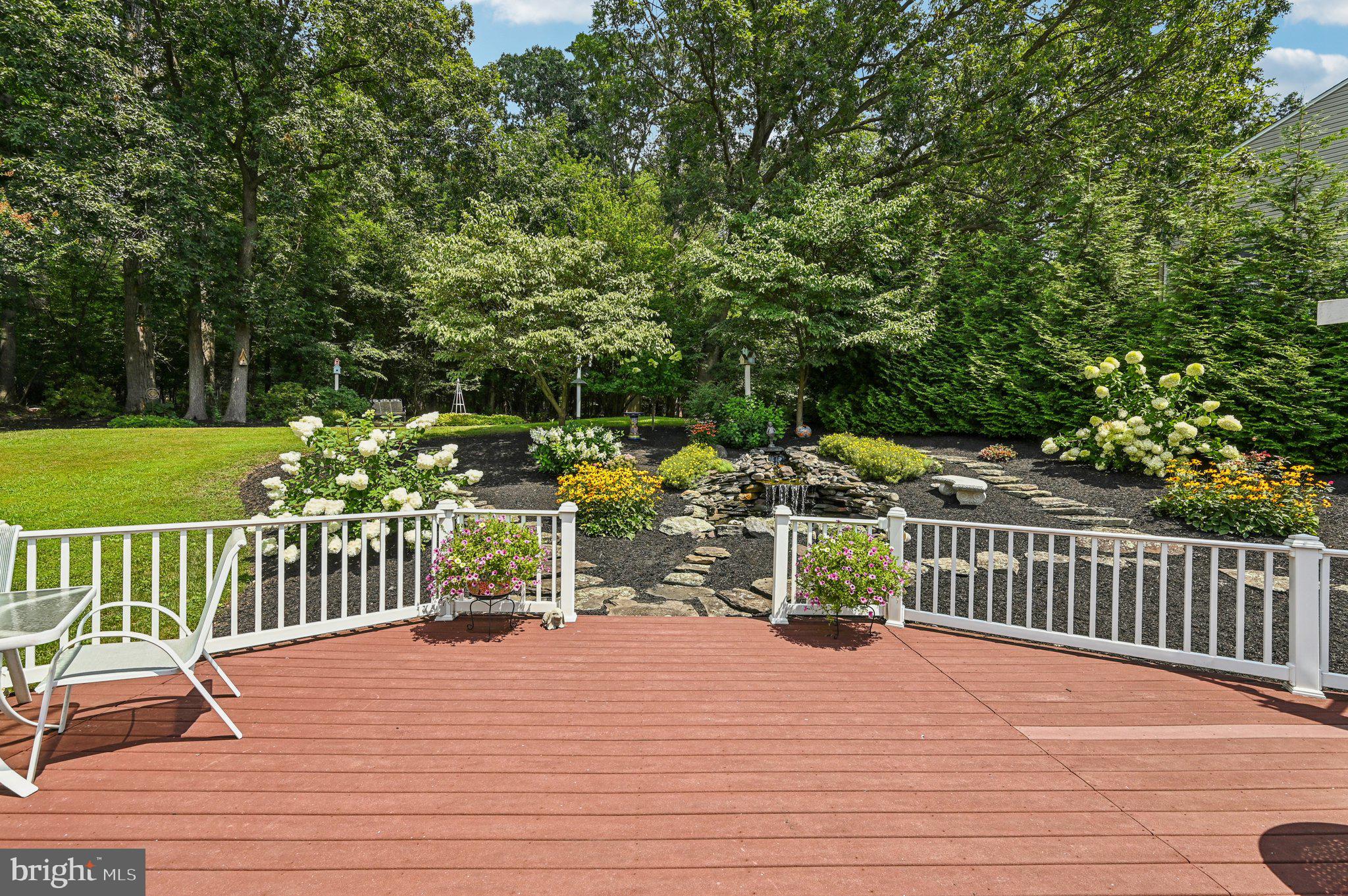 3137 Pyramid Circle Manchester, MD 21102 - Photo 4 of 55 a view of a deck with chairs and wooden fence