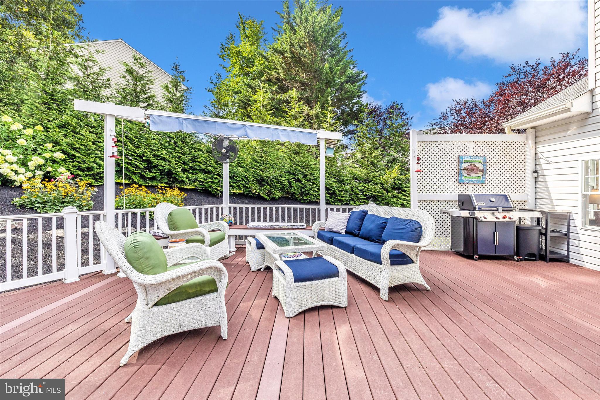 3137 Pyramid Circle Manchester, MD 21102 - Photo 38 of 55 a view of a deck with couches with wooden floor and fence