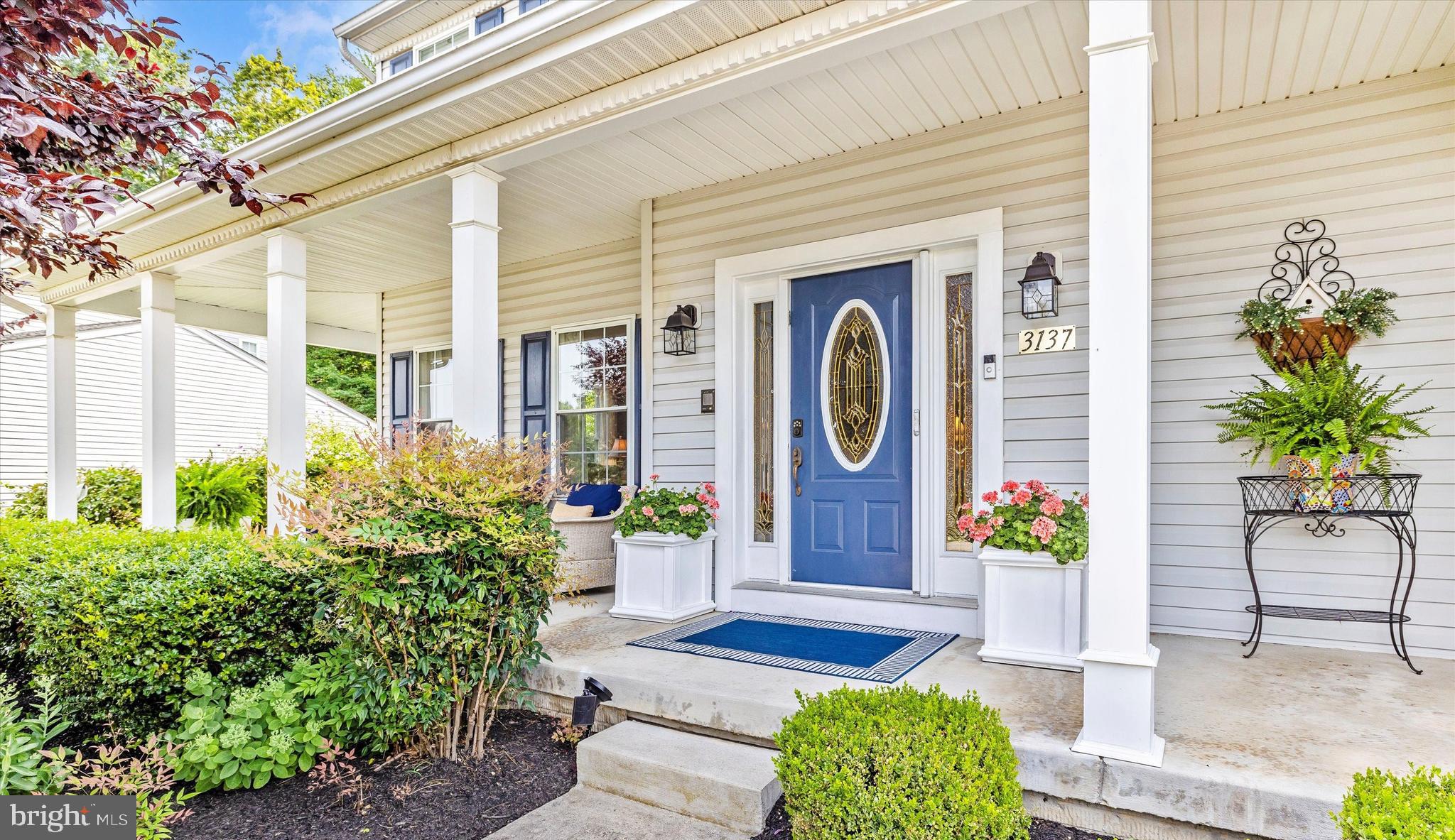 3137 Pyramid Circle Manchester, MD 21102 - Photo 46 of 55 a front view of a house with garden