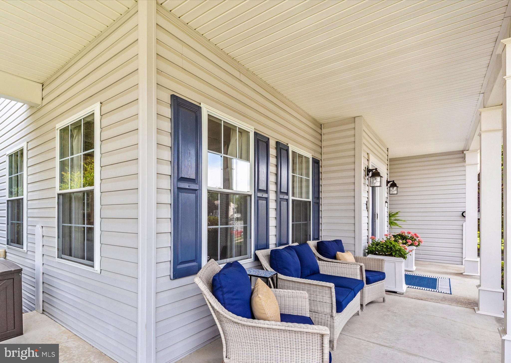 3137 Pyramid Circle Manchester, MD 21102 - Photo 47 of 55 a view of a house with a chairs and table in a patio