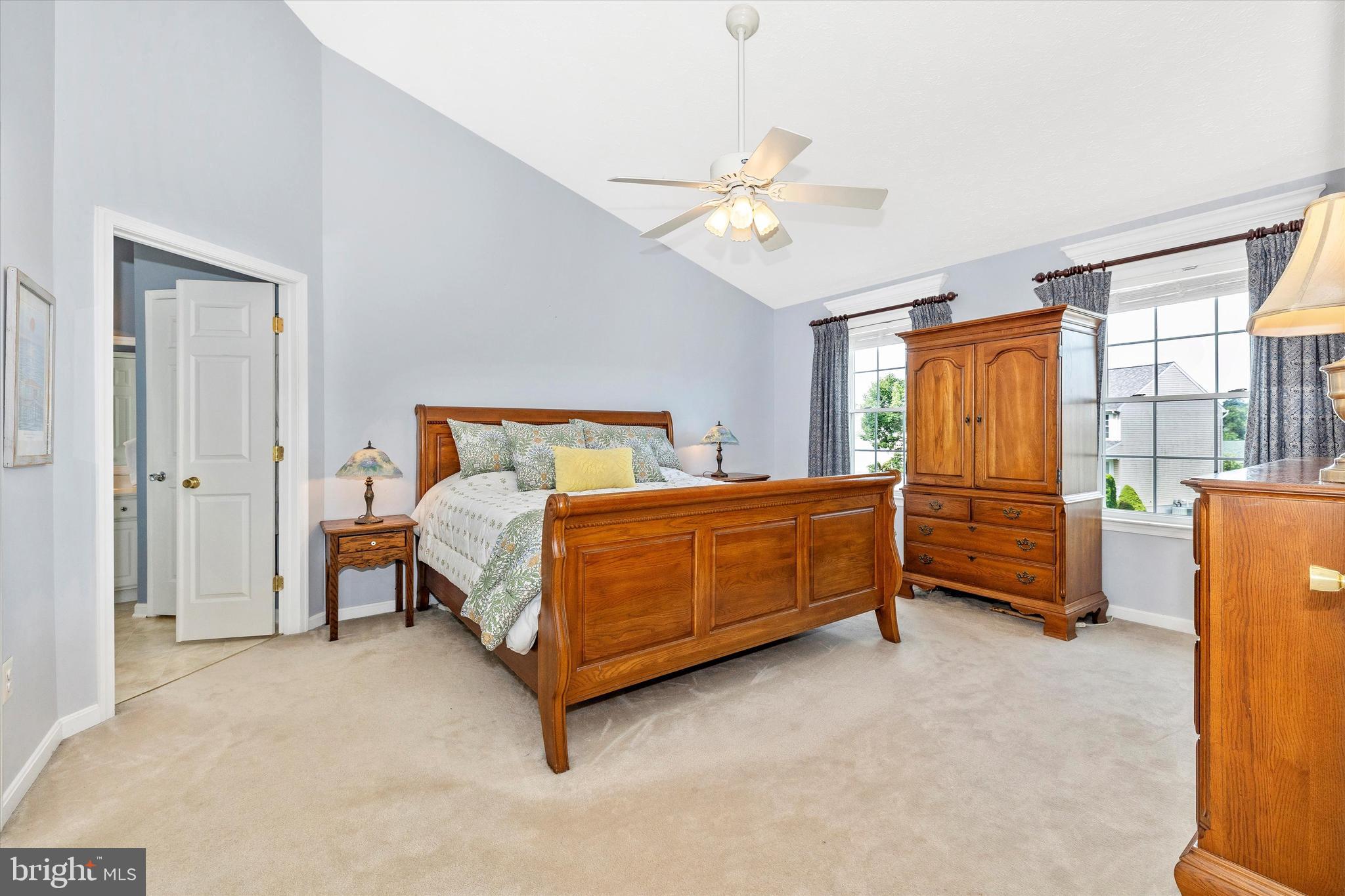 3137 Pyramid Circle Manchester, MD 21102 - Photo 10 of 55 a bedroom with a bed and a chandelier