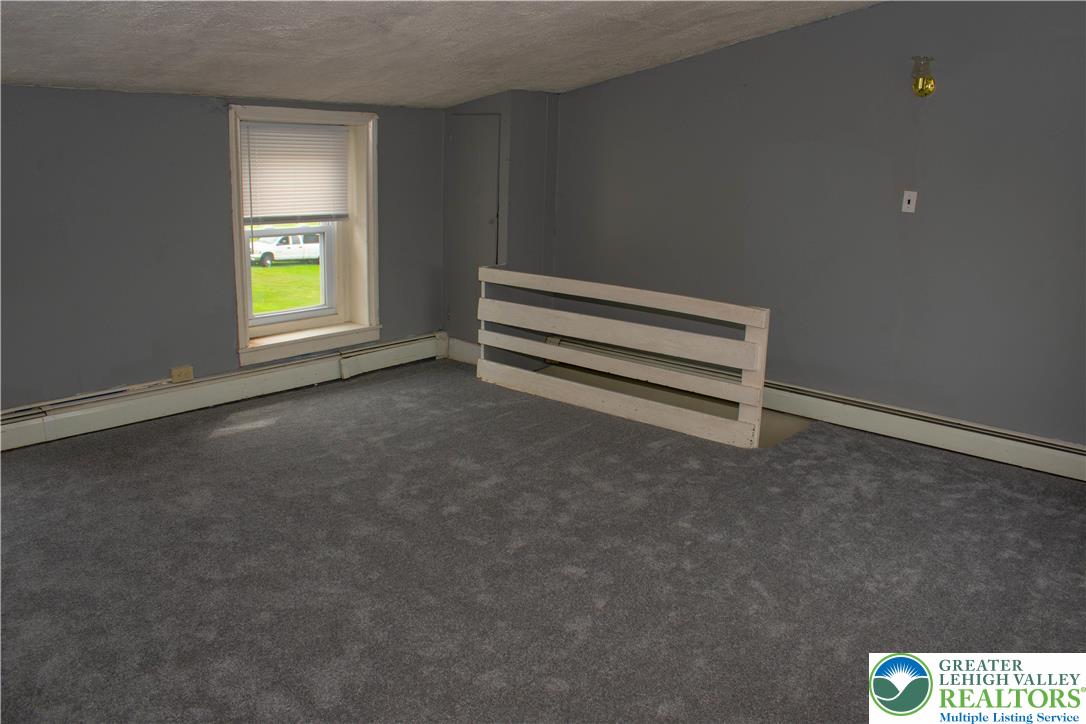 3914 Mauch Chunk Road Coplay, PA 18037 - Photo 7 of 8 a view of an empty room with a window