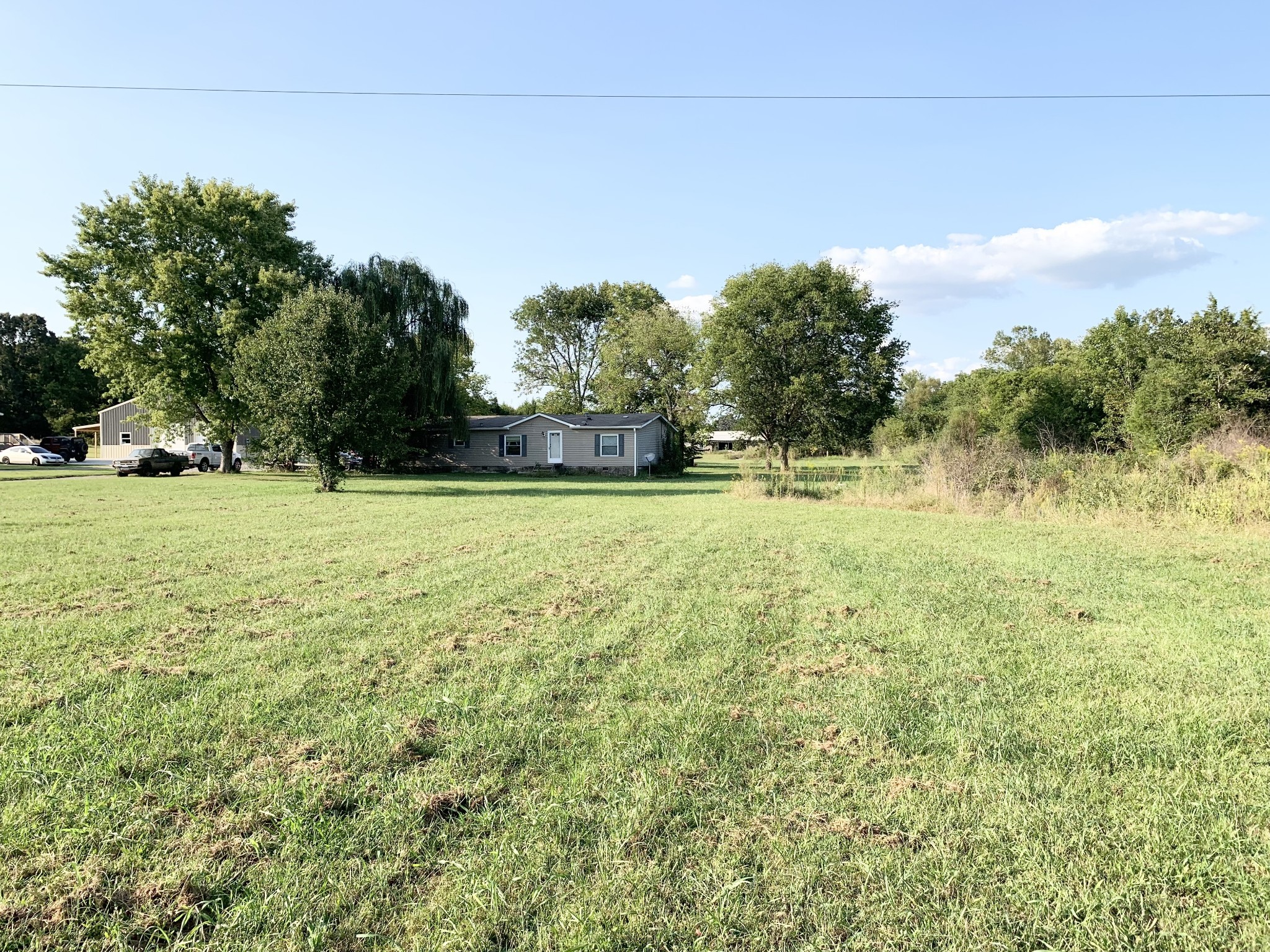 1775 Burford Road Lebanon, TN 37087 - Photo 1 of 31 a view of a field with an trees in the background
