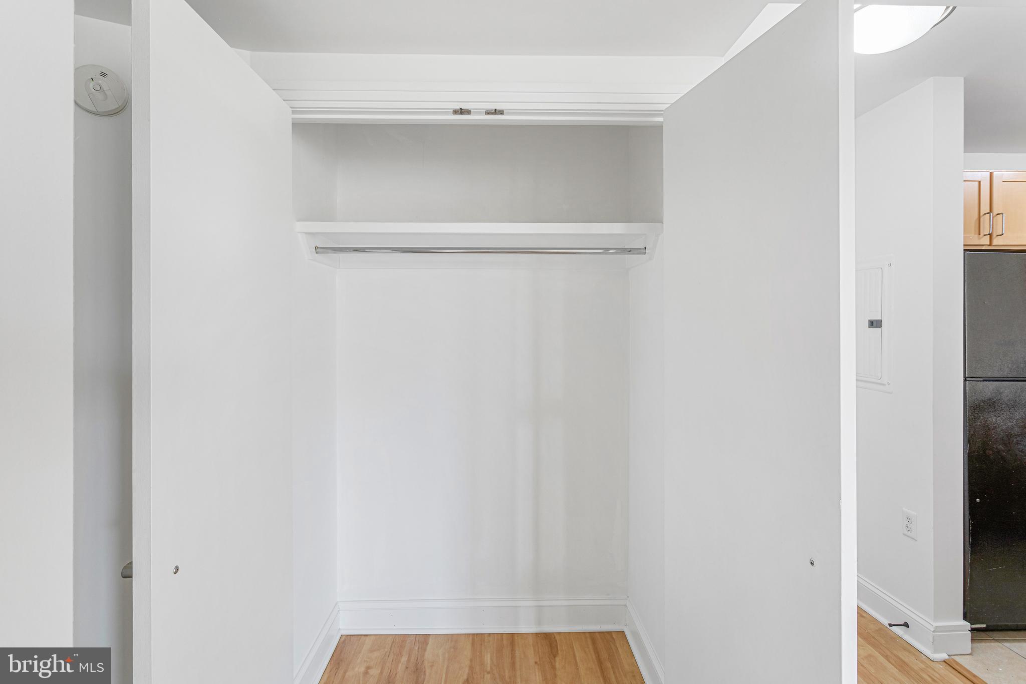 800 4th Street Southwest, Unit S425 Washington, DC 20024 - Photo 18 of 27 a view of walk in closet with clothes