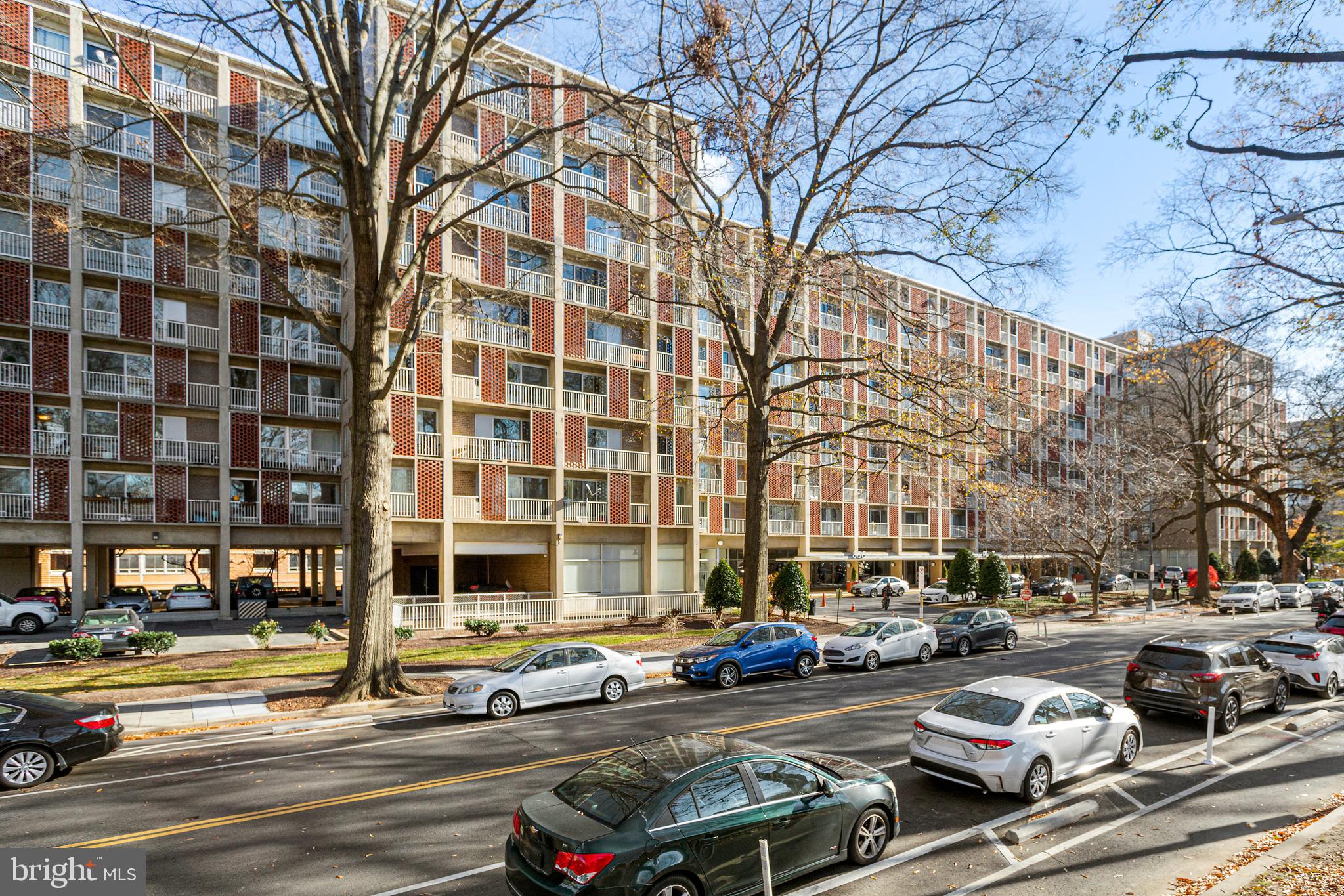 800 4th Street Southwest, Unit S425 Washington, DC 20024 - Photo 20 of 27 a city street lined with buildings and cars