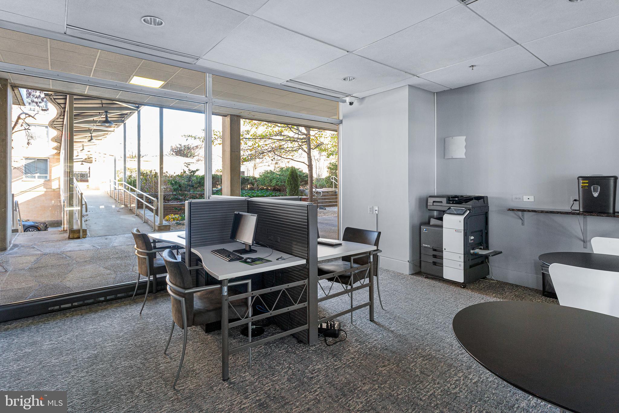 800 4th Street Southwest, Unit S425 Washington, DC 20024 - Photo 22 of 27 a dining room with furniture and a floor to ceiling window