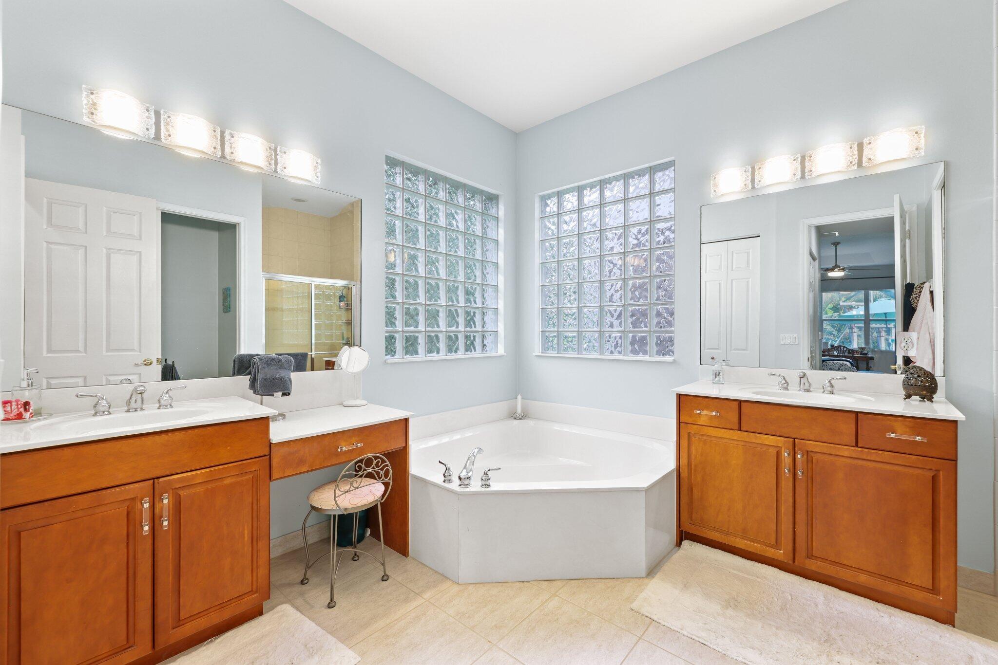 19090 Skyridge Circle Boca Raton, FL 33498 - Photo 24 of 70 a large spacious bathroom with a large tub and sink