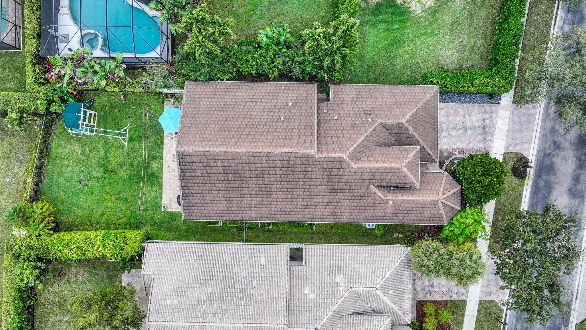 19090 Skyridge Circle Boca Raton, FL 33498 - Photo 51 of 70 a aerial view of a house with a yard and potted plants