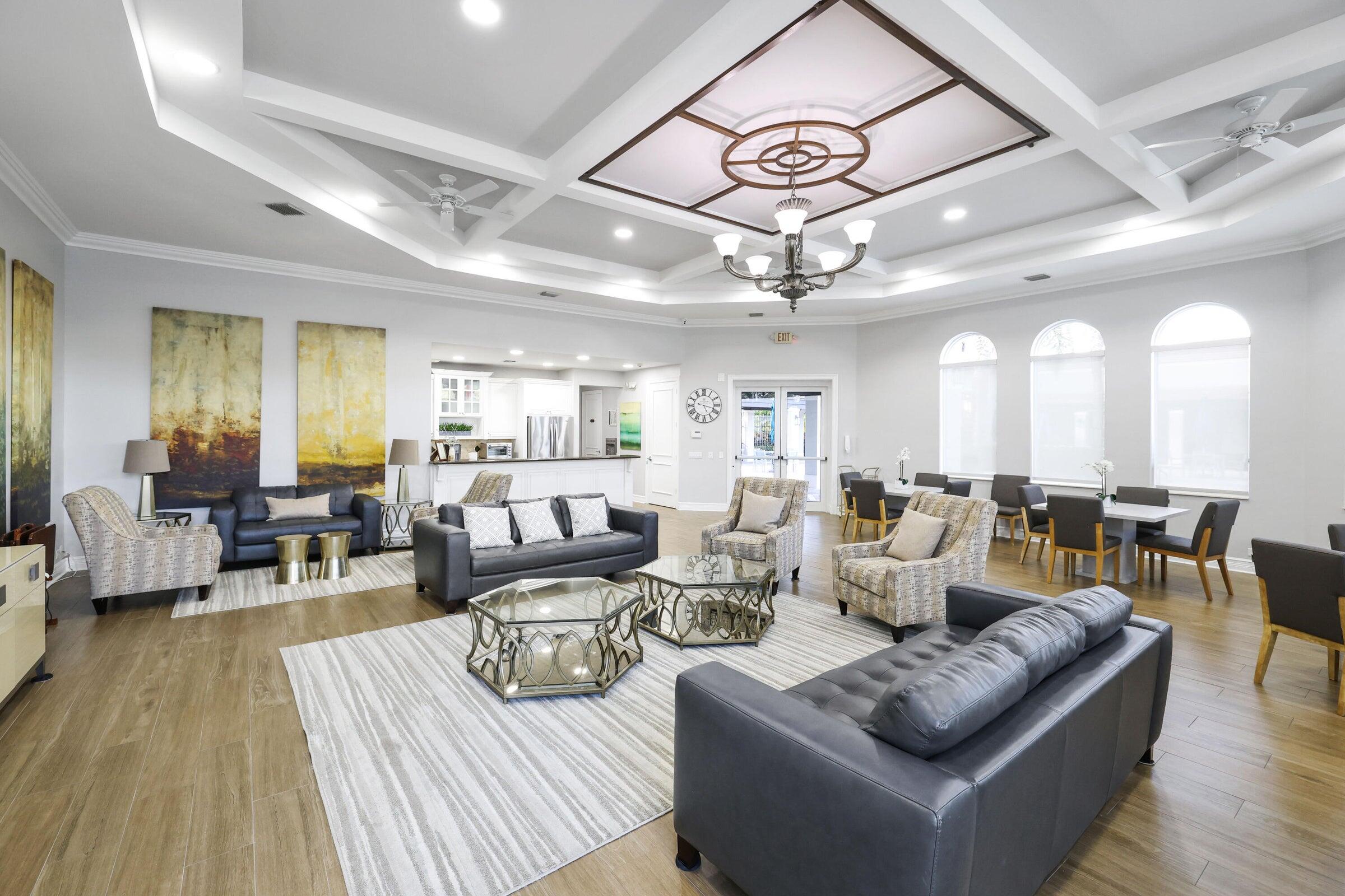19090 Skyridge Circle Boca Raton, FL 33498 - Photo 62 of 70 a living room with lots of furniture and view of kitchen