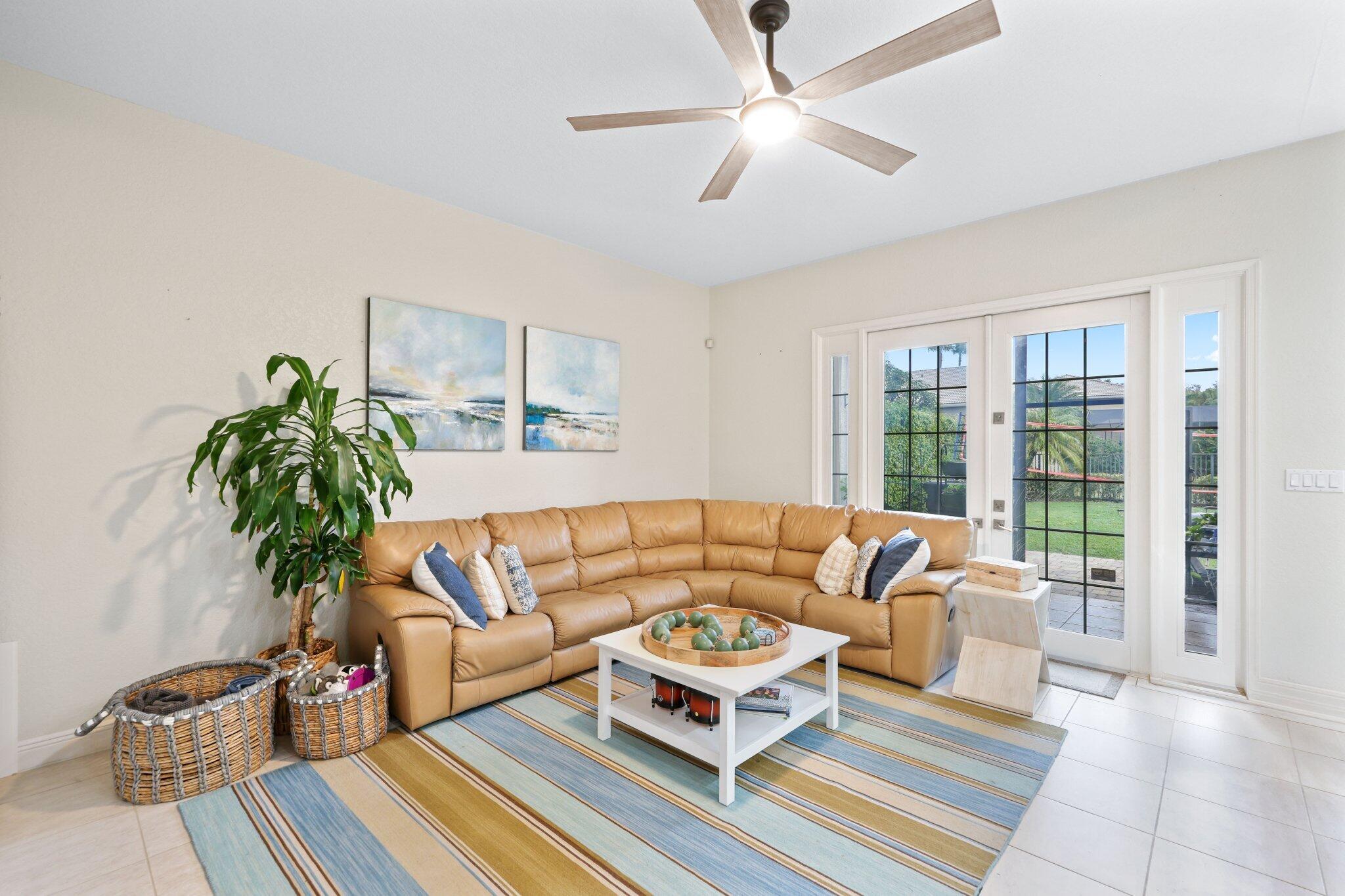 19090 Skyridge Circle Boca Raton, FL 33498 - Photo 10 of 70 a living room with furniture and a potted plant