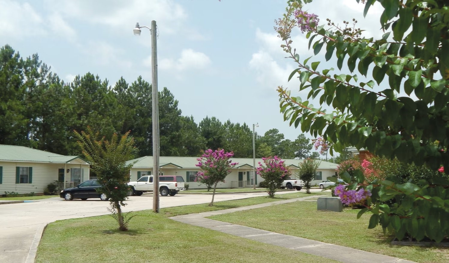 24598 Gulf Bay Road Other, AL 36561 - Photo 5 of 6 a childrens park with lots of swings and slides