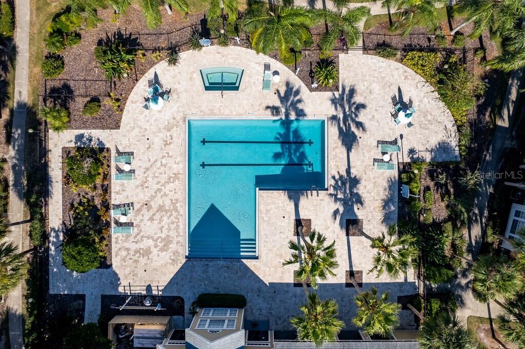 1063 South Hiawassee Road, Unit 1624 Orlando, FL 32835 - Photo 16 of 20 an aerial view of a house with a yard and large trees