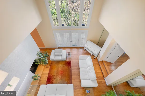 a bed room with a bed and a chair