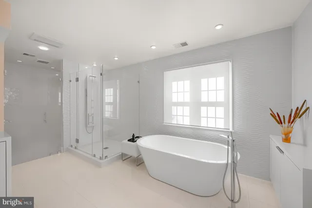 a bedroom with furniture and a book shelf