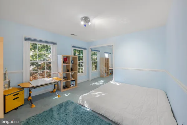 a bathroom with a bathtub shower sink and toilet