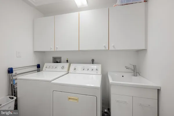 a living room with fireplace furniture and a wooden floor