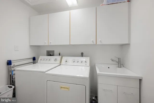 a living room with fireplace furniture and a wooden floor