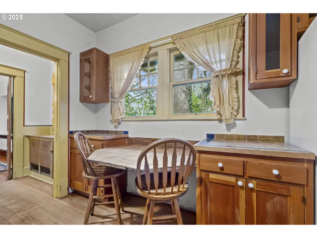 a view of livingroom with washer and dryer