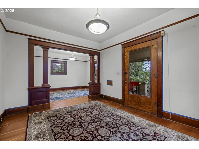 a view of an empty room and window