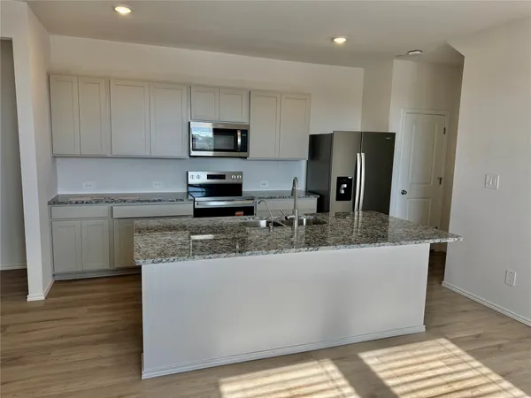 $299,990 | 104 Calcite Road, Unit 5, Kyle, TX 78640