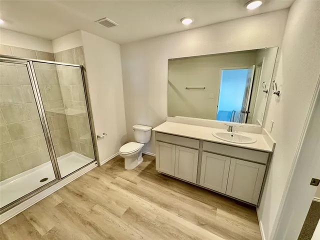 a view of a two chairs in the balcony