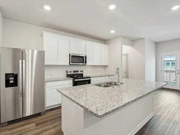 $299,990 | 104 Calcite Road, Unit 5, Kyle, TX 78640