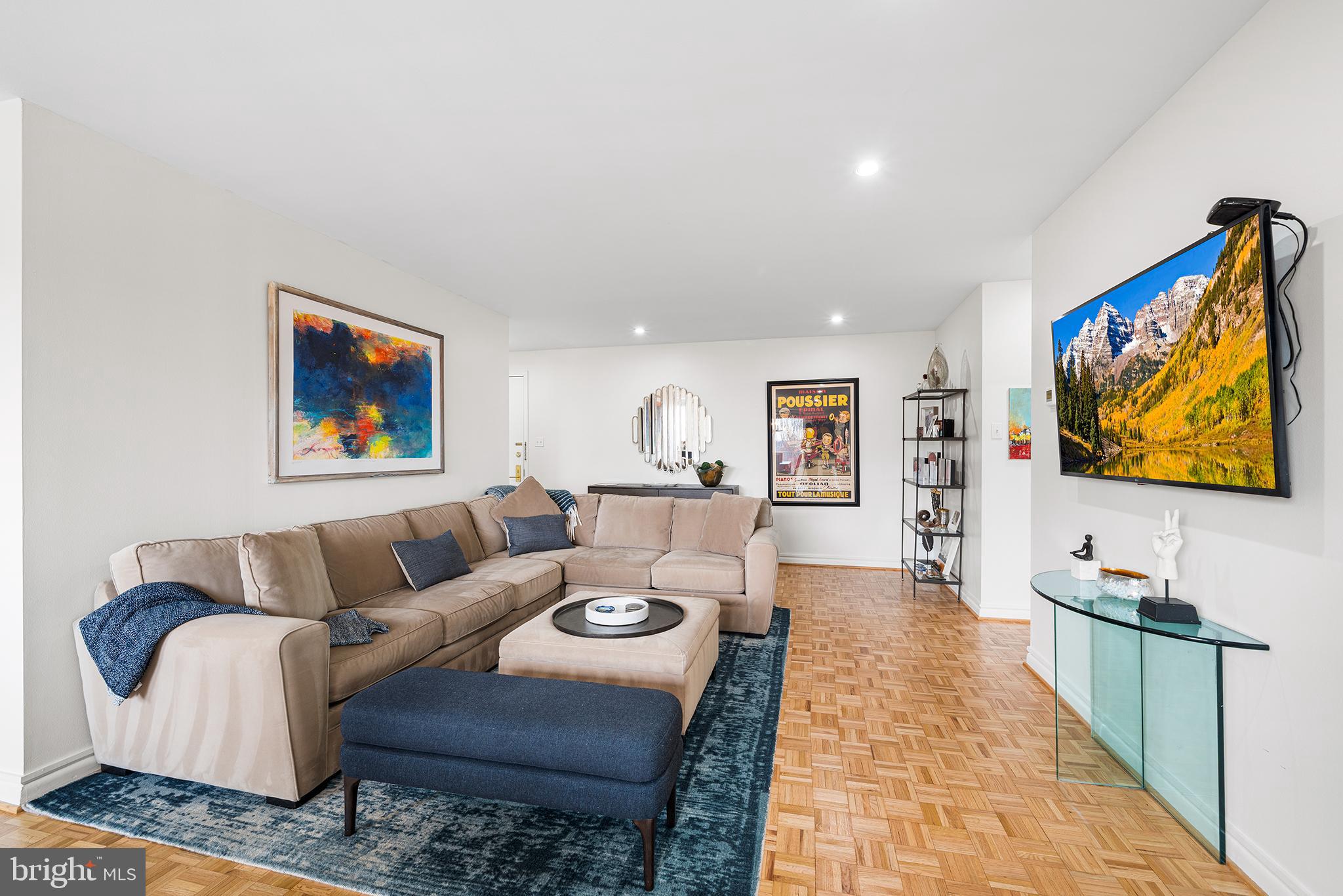 1655 Oakwood Drive, Unit N420 Narberth, PA 19072 - Photo 11 of 36 a living room with furniture and a flat screen tv