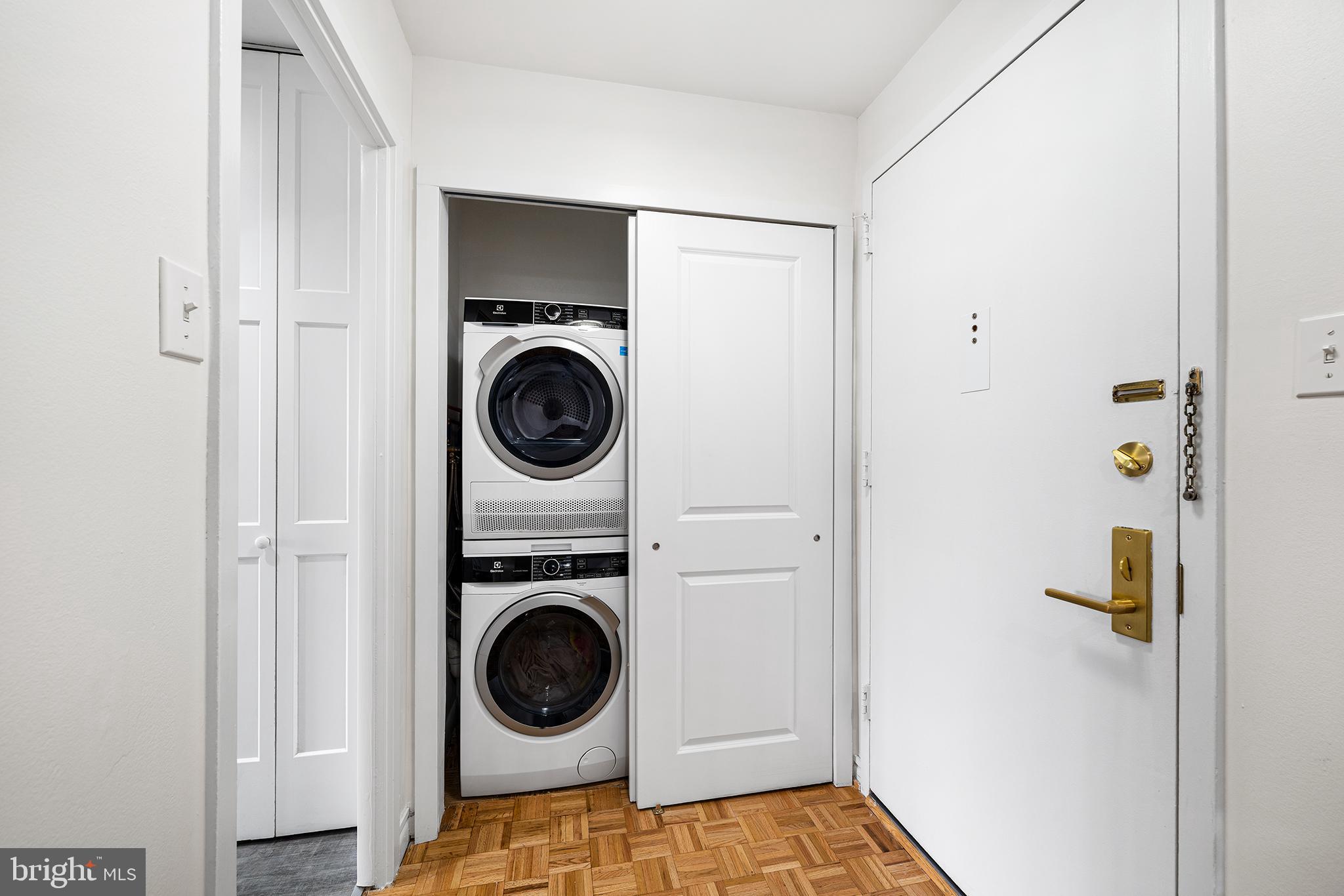 1655 Oakwood Drive, Unit N420 Narberth, PA 19072 - Photo 29 of 36 a utility room with dryer and washer
