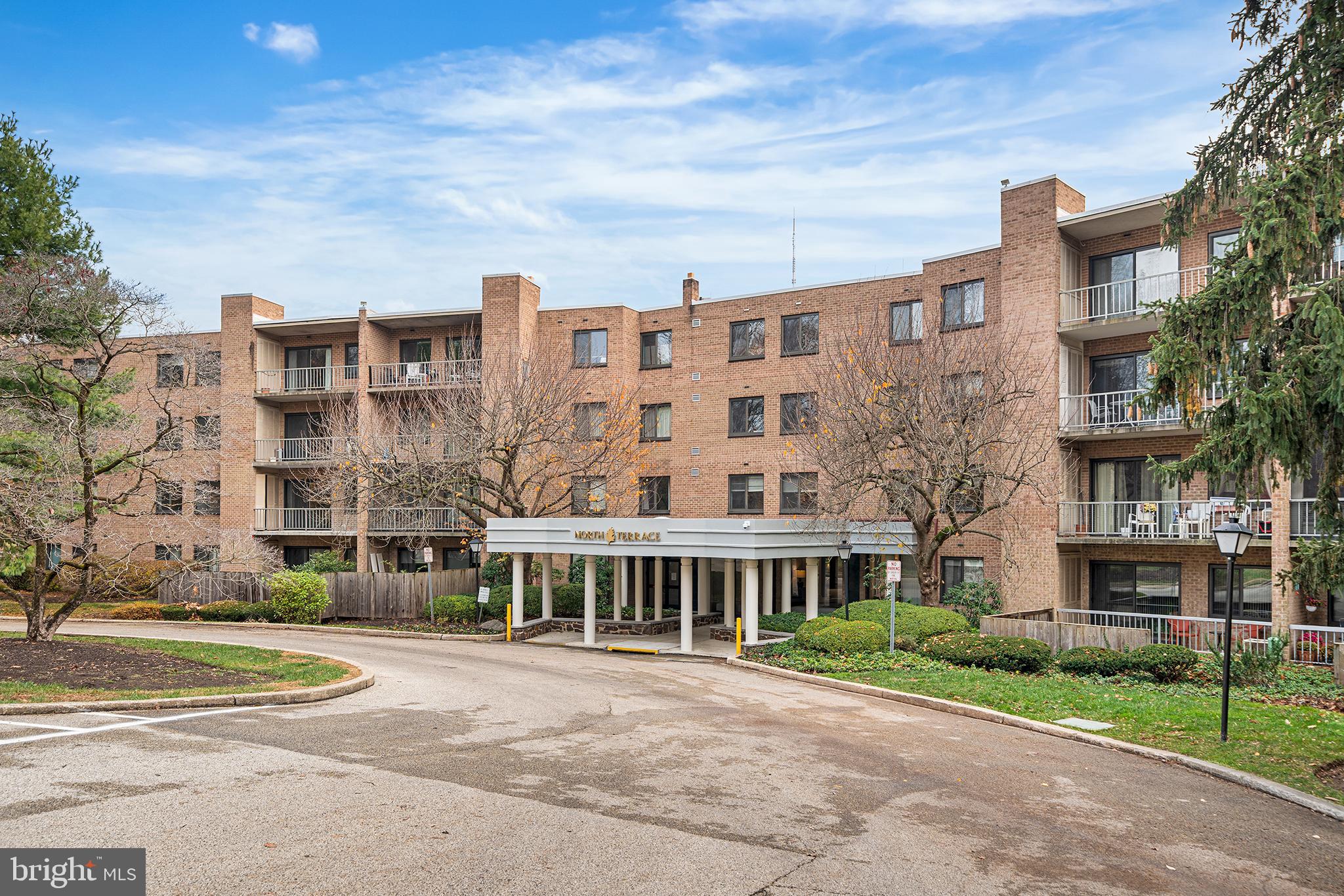 1655 Oakwood Drive, Unit N420 Narberth, PA 19072 - Photo 35 of 36 a view of a building with a street