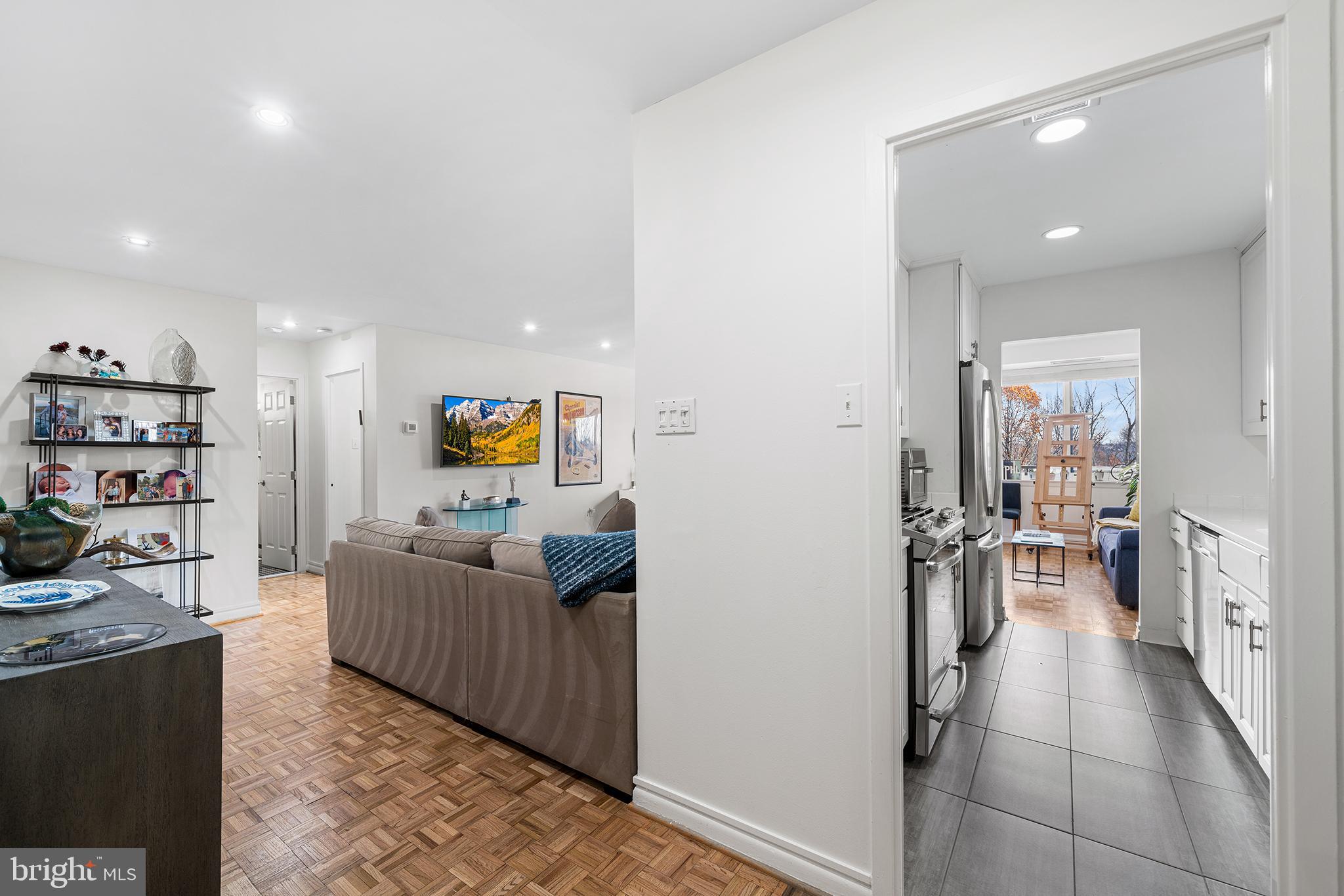1655 Oakwood Drive, Unit N420 Narberth, PA 19072 - Photo 5 of 36 a living room with furniture and a wooden floor