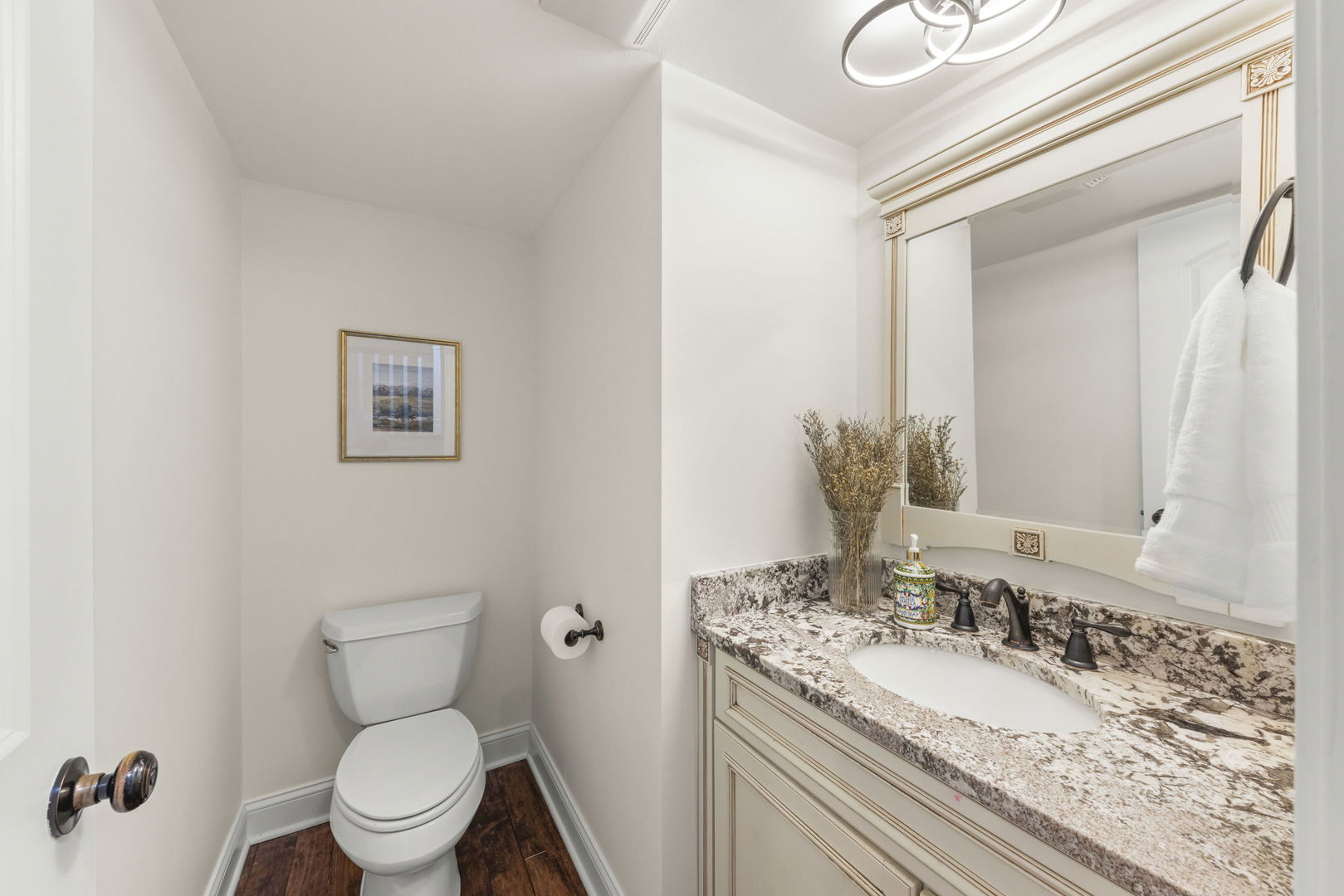 389 Pearson Circle Naperville, IL 60563 - Photo 14 of 41 a bathroom with a granite countertop toilet sink and mirror