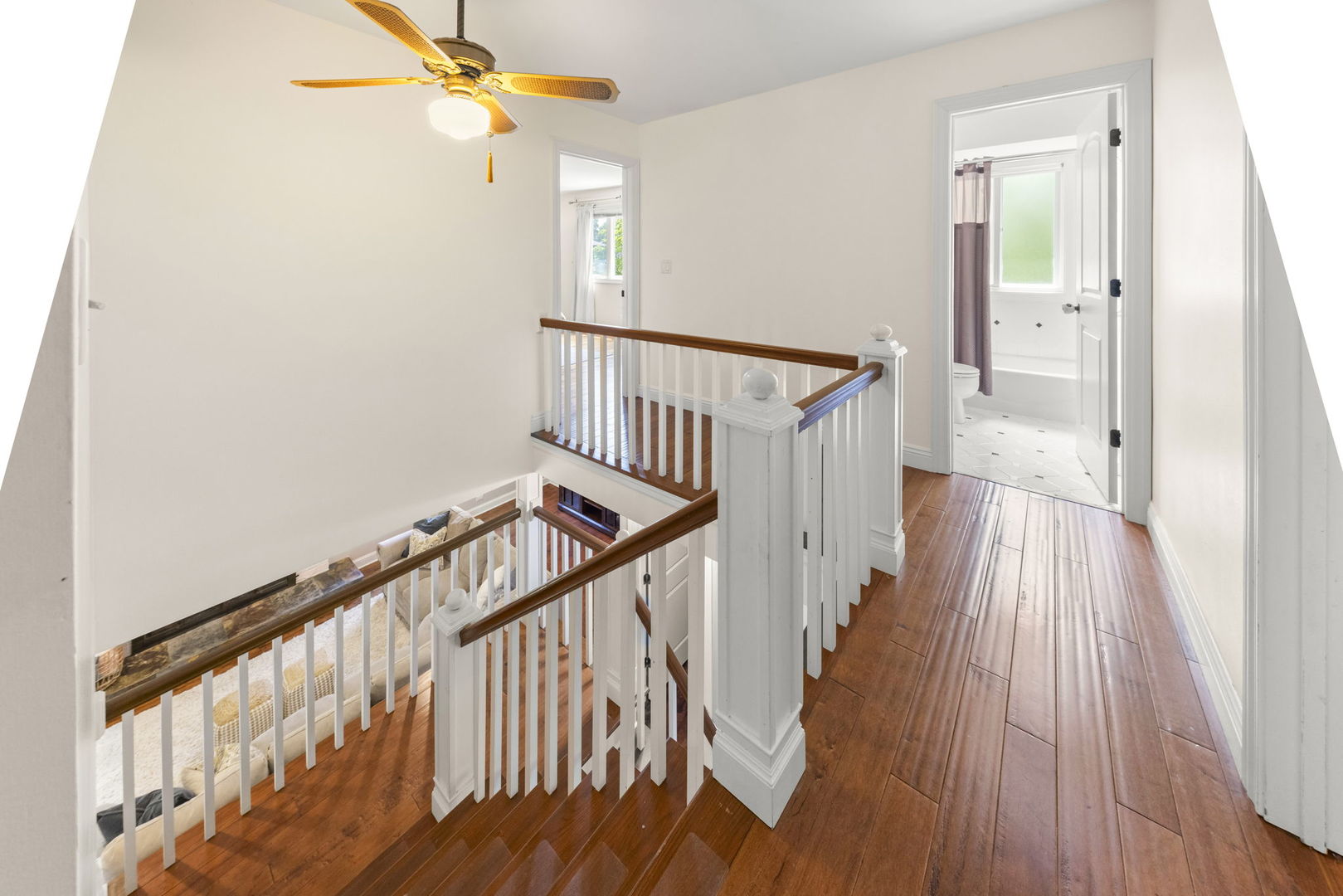 389 Pearson Circle Naperville, IL 60563 - Photo 15 of 41 a view of a hallway with wooden floor and staircase