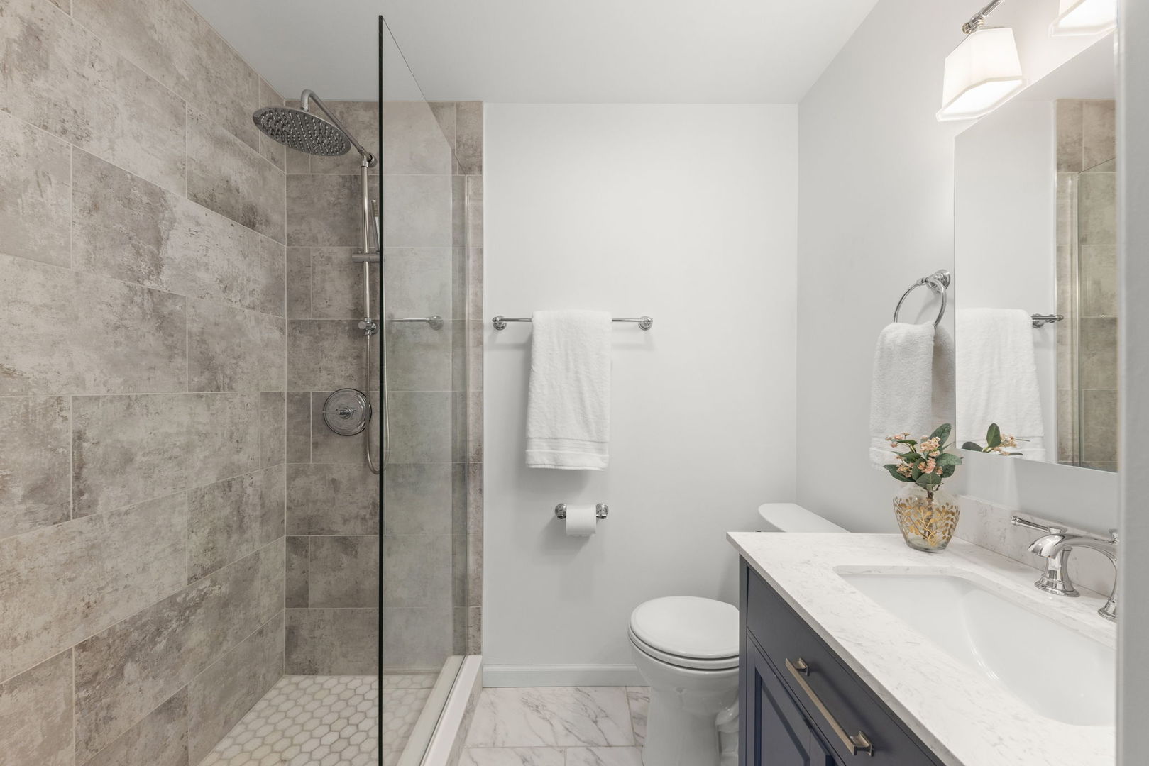 389 Pearson Circle Naperville, IL 60563 - Photo 18 of 41 a bathroom with a sink toilet and shower