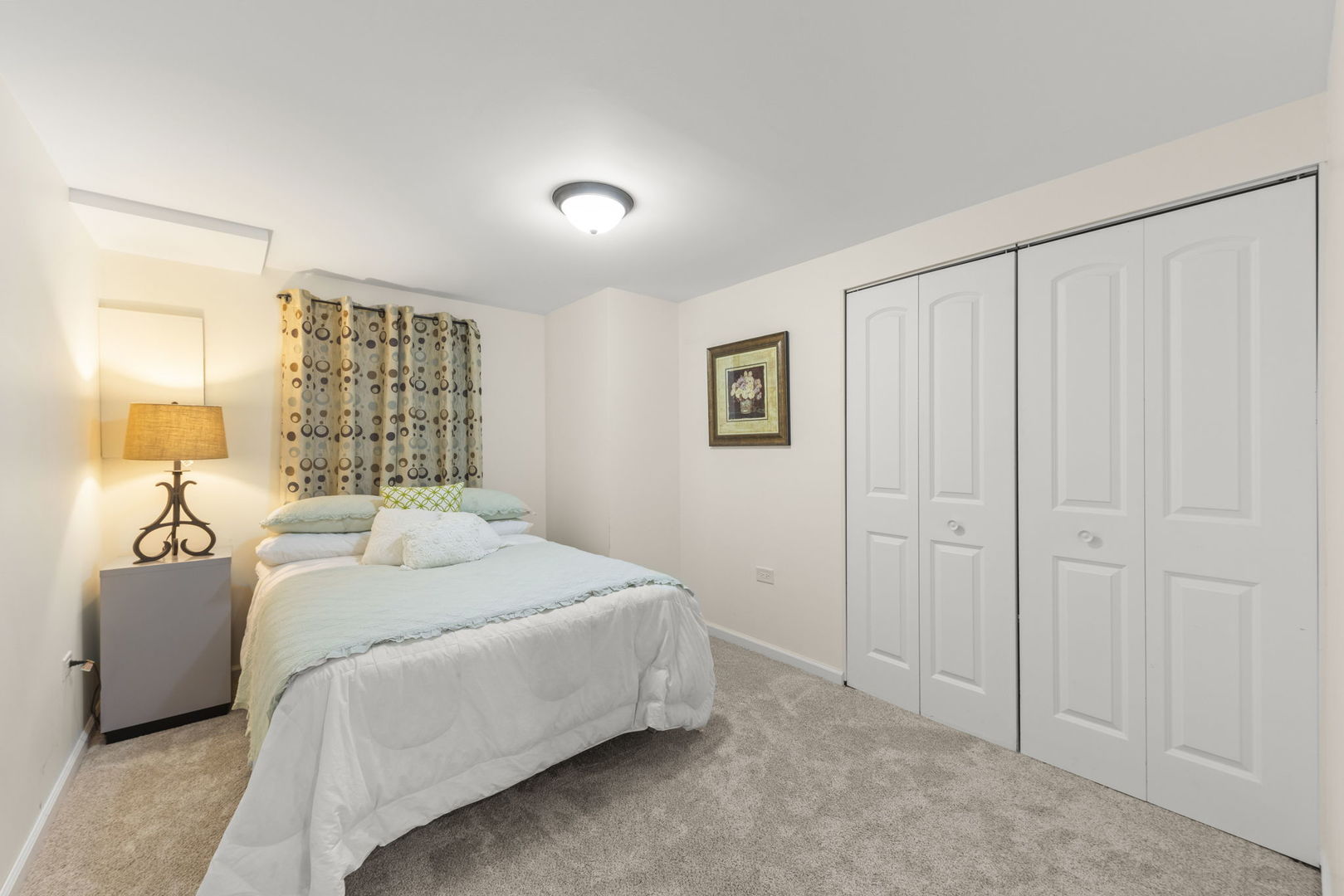 389 Pearson Circle Naperville, IL 60563 - Photo 26 of 41 a bedroom with a bed and a night stand