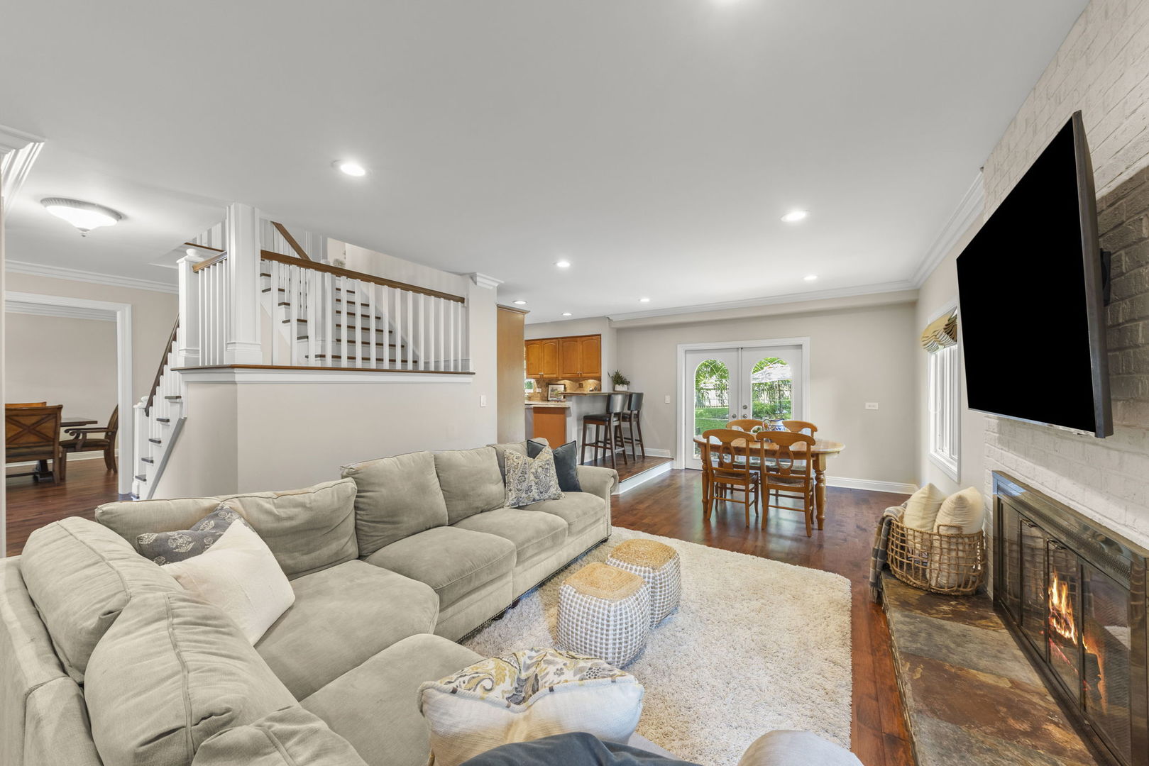 389 Pearson Circle Naperville, IL 60563 - Photo 3 of 41 a living room with furniture and a flat screen tv